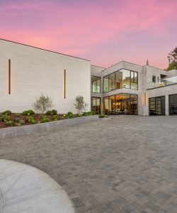 A modern house with a spacious driveway